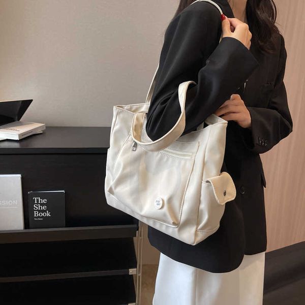 version canvas bag for women's new trend splicing high-end and versatile shoulder bag college student tote bag
version canvas bag for women's new trend splicing high-end and versatile shoulder bag college student tote bag