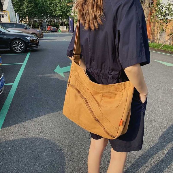 washed canvas bag for women new messenger bag large capacity messenger bag for college students
washed canvas bag for women new messenger bag large capacity messenger bag for college students