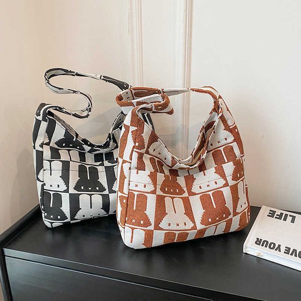 year new high capacity women's simple and casual little rabbit shoulder bag versatile for college students' commuting tote bag
year new high capacity women's simple and casual little rabbit shoulder bag versatile for college students' commuting tote bag