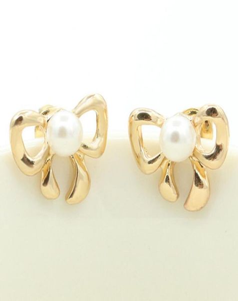 big pearl earrings cute hollow bow knot earring stud gold plated for women girls party ear jewelry 751112, Golden;silver
big pearl earrings cute hollow bow knot earring stud gold plated for women girls party ear jewelry 751112, Golden;silver