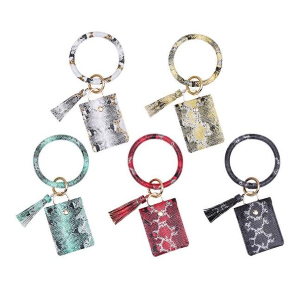 women bangle wristlets wallet coin purses tassels keychain card holder bag trendy leopard pu leather bracelets animal print bag, White
women bangle wristlets wallet coin purses tassels keychain card holder bag trendy leopard pu leather bracelets animal print bag, White
