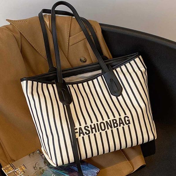 commuter high capacity bag new women's bag leisure and western style versatile canvas shoulder bag college student tote bag
commuter high capacity bag new women's bag leisure and western style versatile canvas shoulder bag college student tote bag