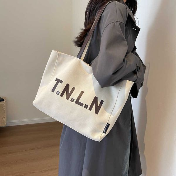 artistic versatile canvas tote bag for women new commuter handbag large capacity student shoulder bag
artistic versatile canvas tote bag for women new commuter handbag large capacity student shoulder bag