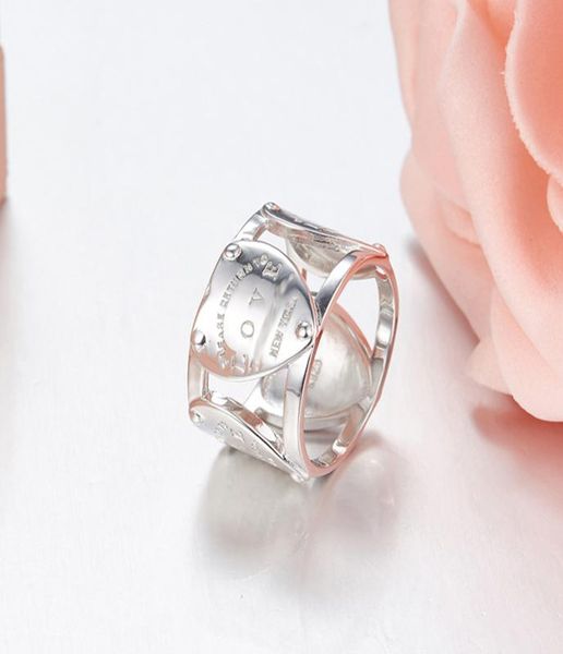 with side stones brand new 925 sterling silver classic love thick ring will not turn black with logo heart model styl8211797
with side stones brand new 925 sterling silver classic love thick ring will not turn black with logo heart model styl8211797