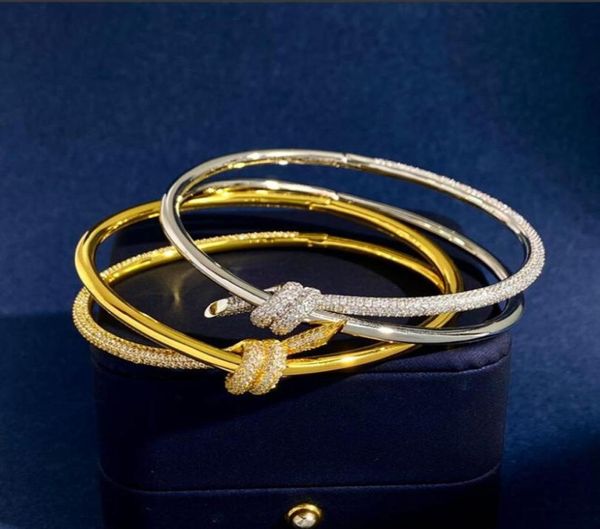 knotted half diamond gold bangle luxury designer monogram hollow bracelet diamond 18k plated 925 stainless steel wedding lovers gi6954855, Black
knotted half diamond gold bangle luxury designer monogram hollow bracelet diamond 18k plated 925 stainless steel wedding lovers gi6954855, Black