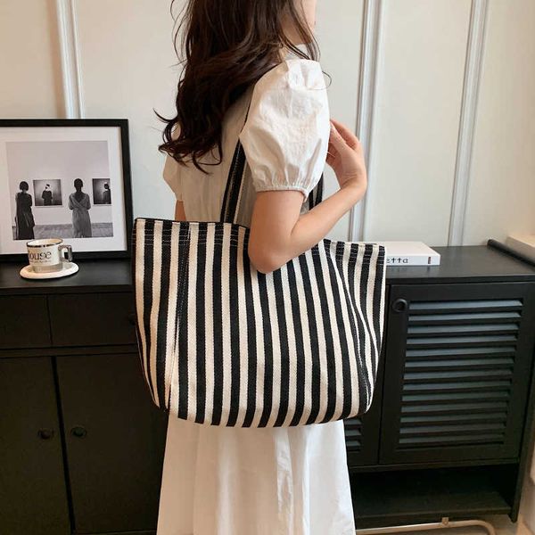 summer new high capacity bag women's canvas stripe one shoulder college student commuter mommy tote bag
summer new high capacity bag women's canvas stripe one shoulder college student commuter mommy tote bag
