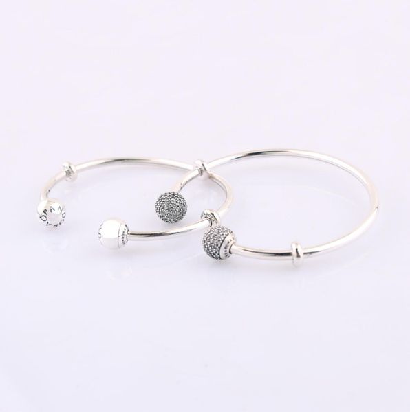authentic 925 sterling silver moments silver open cuff bangle with pave caps fits european style jewelry charms beads 59643902zc1072772, Black
authentic 925 sterling silver moments silver open cuff bangle with pave caps fits european style jewelry charms beads 59643902zc1072772, Black