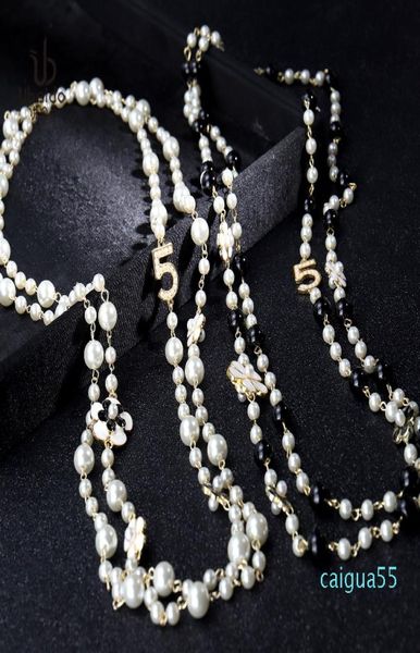 fashion luxury designer classic flower elegant bright pearl multi layer long winter sweater statement necklace for woman5258246, Black
fashion luxury designer classic flower elegant bright pearl multi layer long winter sweater statement necklace for woman5258246, Black