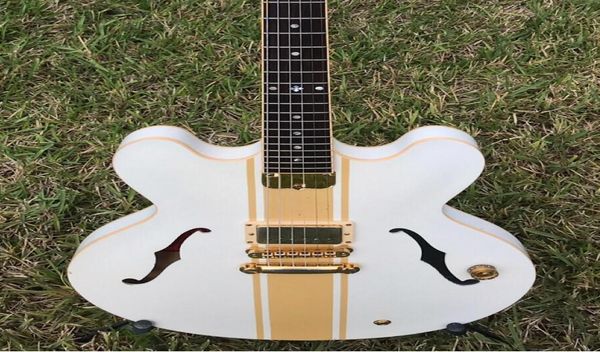 rare es 333 tom delonge signature semi hollow body white gold stripe jazz electric guitar black body binding single pickup gold 7258413
rare es 333 tom delonge signature semi hollow body white gold stripe jazz electric guitar black body binding single pickup gold 7258413