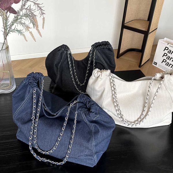 version large capacity shoulder bag for women new chain casual tote bag for students 0327
version large capacity shoulder bag for women new chain casual tote bag for students 0327