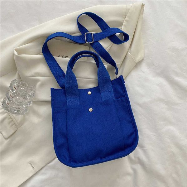 student shaped three-dimensional tote canvas hand carrying messenger bag simple and versatile one shoulder handbag messenger bag fashion
student shaped three-dimensional tote canvas hand carrying messenger bag simple and versatile one shoulder handbag messenger bag fashion