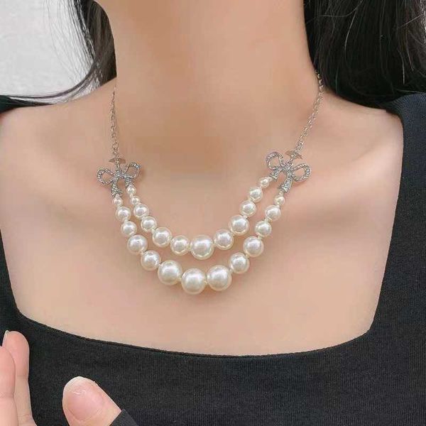 empress dowager xi's new double layer pearl bow saturn necklace women's fashion luxury temperament high edition neckwear, Silver
empress dowager xi's new double layer pearl bow saturn necklace women's fashion luxury temperament high edition neckwear, Silver