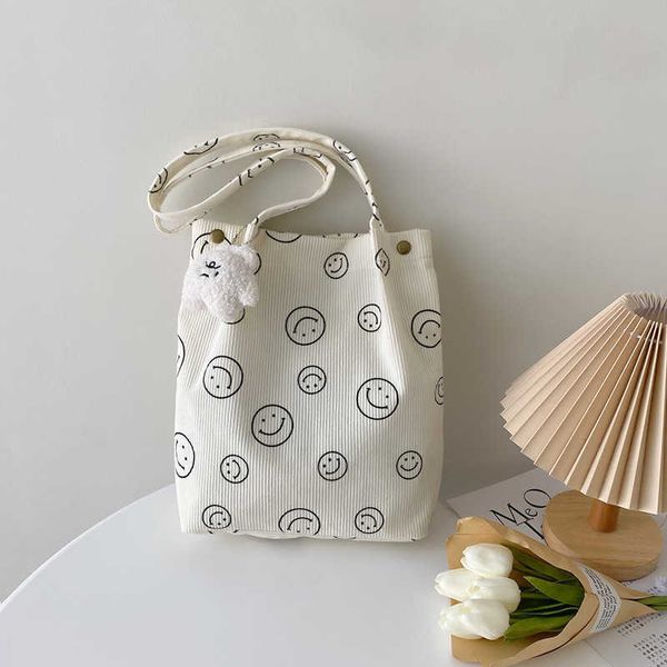 new bag women's corduroy smiling face one shoulder tote bag ins girls' school velvet bag
new bag women's corduroy smiling face one shoulder tote bag ins girls' school velvet bag