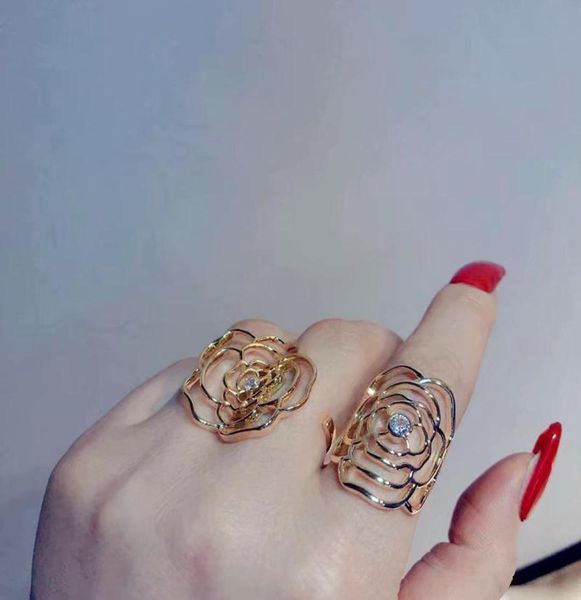 style elegant rhinestone camellia modelling rings for women trendy delicate hollow out metal open ring celebrity jewelry cluster6255102, Golden;silver
style elegant rhinestone camellia modelling rings for women trendy delicate hollow out metal open ring celebrity jewelry cluster6255102, Golden;silver
