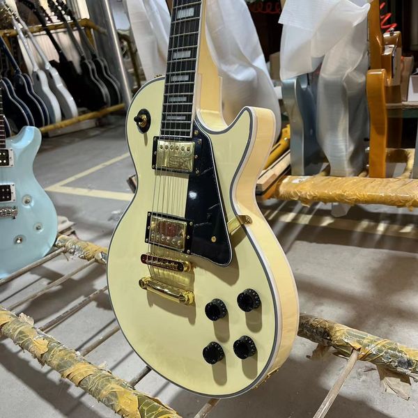 custom cream yellow electric guitar solid color body, auto-tuning bridge, gold hardware, ing
custom cream yellow electric guitar solid color body, auto-tuning bridge, gold hardware, ing