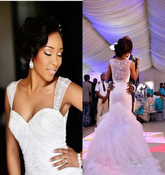 major beaded sleeveless mermaid wedding dresses satin organza see through abiti da sposa cap chapel train ruffles bridal gowns6495219, White
major beaded sleeveless mermaid wedding dresses satin organza see through abiti da sposa cap chapel train ruffles bridal gowns6495219, White