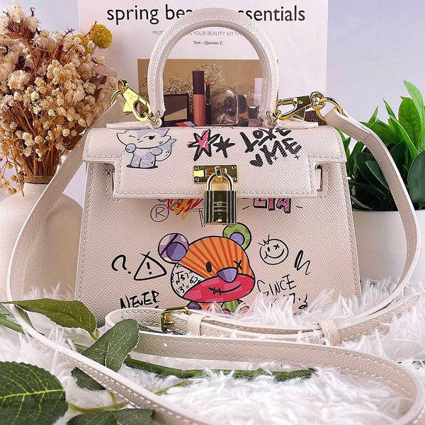 designer kelys tote bag small personality cub graffiti high level sense versatile bag mini summer 2023 fashionable portable messenger18gl
designer kelys tote bag small personality cub graffiti high level sense versatile bag mini summer 2023 fashionable portable messenger18gl