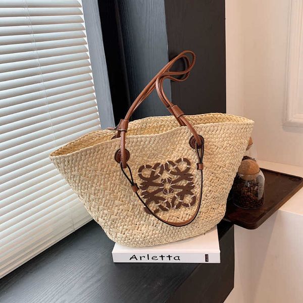 this year's popular niche design straw woven 2023 new women's fashion commuting single shoulder underarm bucket bag
this year's popular niche design straw woven 2023 new women's fashion commuting single shoulder underarm bucket bag