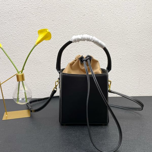 square bucket handbag shoulder crossbody bag classic three dimensional letters drawstring closure leather shoulder straps detachable adjusta
square bucket handbag shoulder crossbody bag classic three dimensional letters drawstring closure leather shoulder straps detachable adjusta