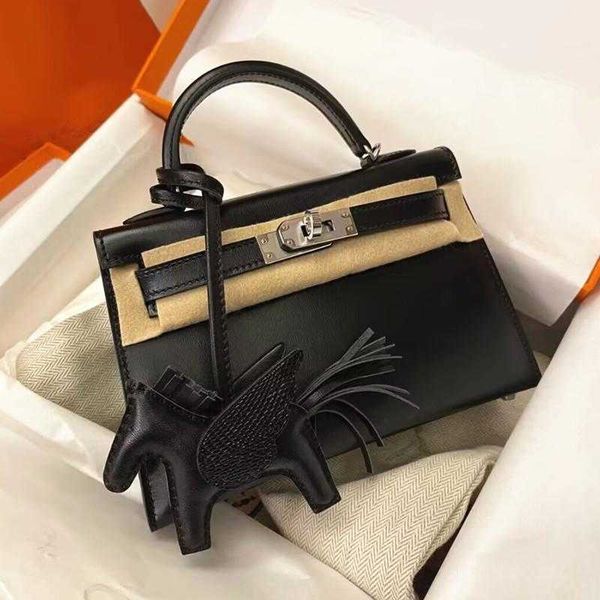 designer kelys tote bag box glossy cow leather second generation bag with silver buckle fashion one shoulder carrying messenger versatile mi
designer kelys tote bag box glossy cow leather second generation bag with silver buckle fashion one shoulder carrying messenger versatile mi