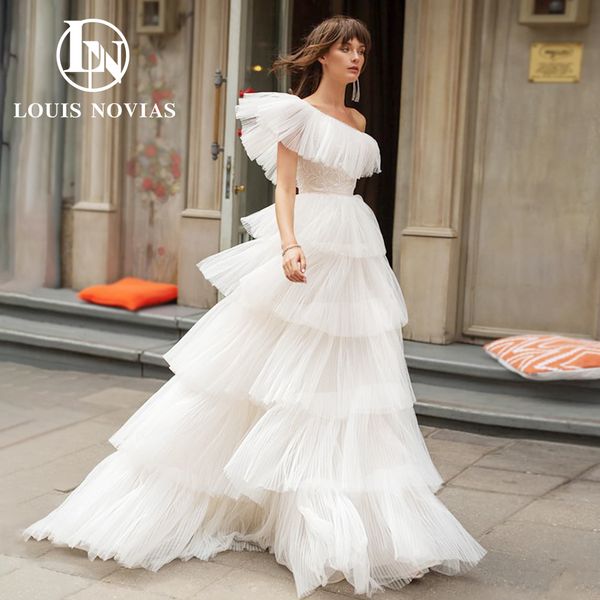 classy a-line wedding dress 2023 dreamy one shoulder brush train tiered skirts lace dress for bride vestidos de novia, White
classy a-line wedding dress 2023 dreamy one shoulder brush train tiered skirts lace dress for bride vestidos de novia, White