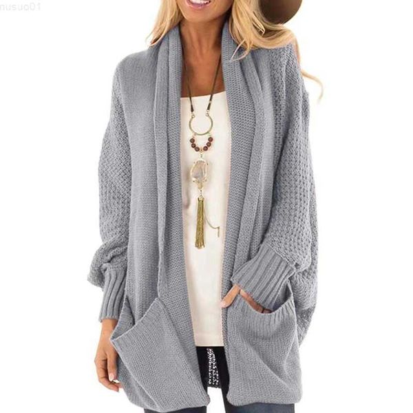 women's sweaters autumn and winter cardigan knitted long sweater women long bat sleeve loose knit cardigans with pockets casual clothes, White;black
women's sweaters autumn and winter cardigan knitted long sweater women long bat sleeve loose knit cardigans with pockets casual clothes, White;black