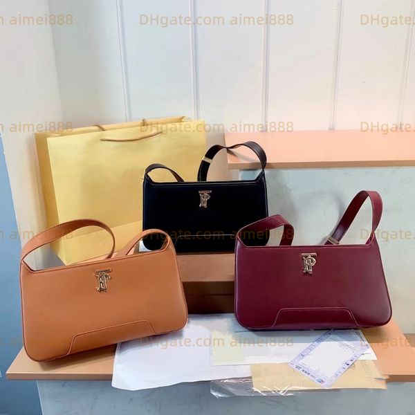 classic tramp underarm shoulder bag fashion leather handbag luxury designer tb shaped bag women's totes cross body purses clutch bags
classic tramp underarm shoulder bag fashion leather handbag luxury designer tb shaped bag women's totes cross body purses clutch bags