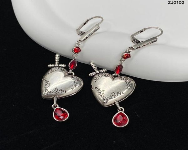 new designed dangle able open love heart sword women earrings asymmetric skull owl micro inlays ear hoop punk style hiphop trend 1037893, Silver
new designed dangle able open love heart sword women earrings asymmetric skull owl micro inlays ear hoop punk style hiphop trend 1037893, Silver