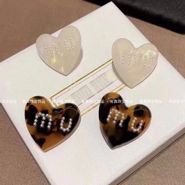 miu women's resin earrings french vintage brown cream white letter heart heart earrings, Golden;silver
miu women's resin earrings french vintage brown cream white letter heart heart earrings, Golden;silver