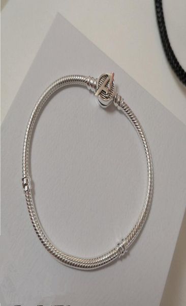 new 100% 925 sterling silver movie mave captin bracelets with logo clasp moments chain for women fit charms beads jewelry diy bracelet 59078, Golden;silver
new 100% 925 sterling silver movie mave captin bracelets with logo clasp moments chain for women fit charms beads jewelry diy bracelet 59078, Golden;silver