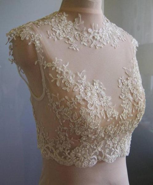 2016 delicate lace bridal jackets jewel neck cap sleeves illusion appliques tulle white ivory champagne bridal shrugs bolero wrap4051511
2016 delicate lace bridal jackets jewel neck cap sleeves illusion appliques tulle white ivory champagne bridal shrugs bolero wrap4051511