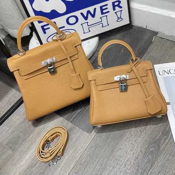 designer kelys tote bag shoulder belt wide small bag minitogo cowhide 2023 new single leather hand messengerp17h
designer kelys tote bag shoulder belt wide small bag minitogo cowhide 2023 new single leather hand messengerp17h