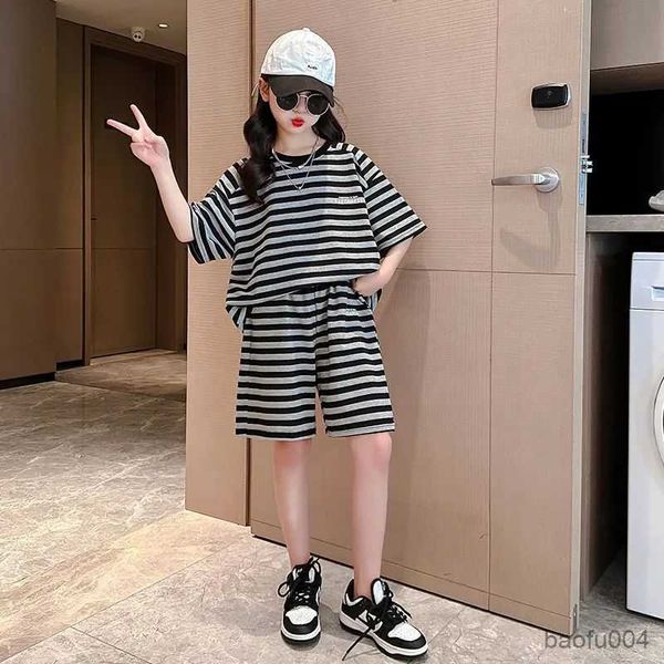 clothing sets 2023 casual new loose sport trousers children girl suit summer five quarter t-shirt short 2pc teens stripe pant r230718, White
clothing sets 2023 casual new loose sport trousers children girl suit summer five quarter t-shirt short 2pc teens stripe pant r230718, White