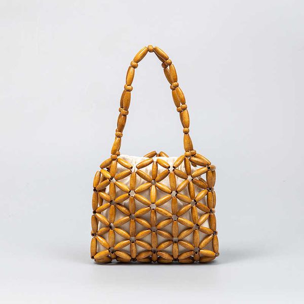 enspt handmade woven wooden bead bag for women with summer trend, niche design, commuting handbag for women 230718
enspt handmade woven wooden bead bag for women with summer trend, niche design, commuting handbag for women 230718