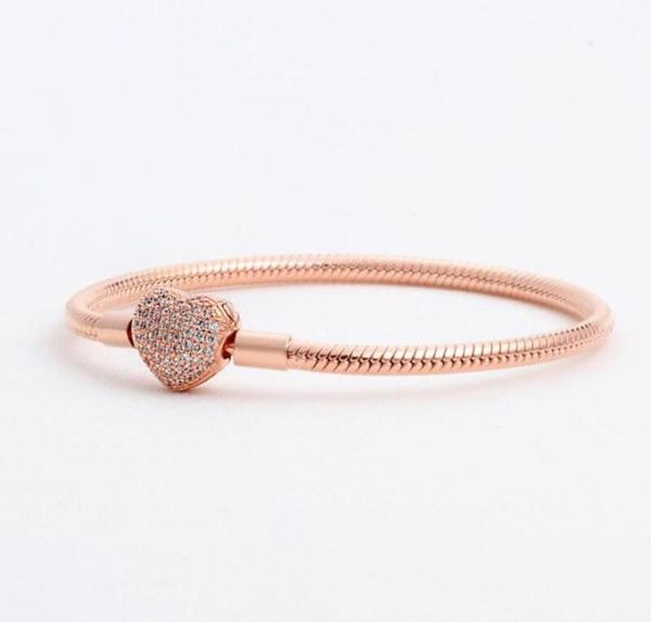 luxury fashion 18k rose gold cz diamond heart bracelets original box for 925 silver smooth chain bracelet women jewelry1701570, Golden;silver
luxury fashion 18k rose gold cz diamond heart bracelets original box for 925 silver smooth chain bracelet women jewelry1701570, Golden;silver