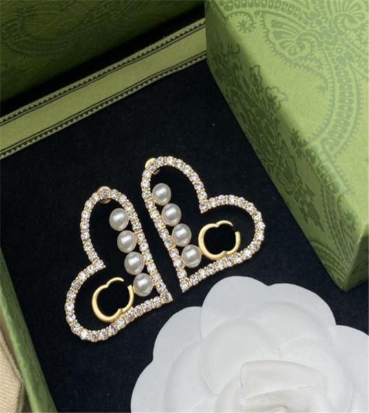luxury earring designer women stud earrings heart shape diamond earring pearls fashion jewelry3178349, Golden;silver
luxury earring designer women stud earrings heart shape diamond earring pearls fashion jewelry3178349, Golden;silver