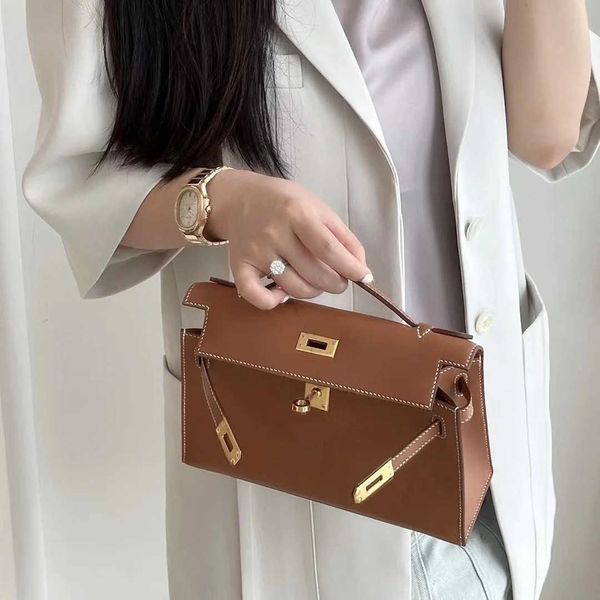 designer kelys tote bag first generation bag swift cowhide one shoulder cross body women's premium leather portable mini chain3bj3
designer kelys tote bag first generation bag swift cowhide one shoulder cross body women's premium leather portable mini chain3bj3