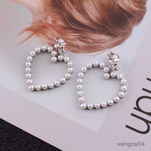 charm new arrival gold silve love heart clip on earrings no pierced for women korean style pearl earrings party wedding jewelry r230719, Golden
charm new arrival gold silve love heart clip on earrings no pierced for women korean style pearl earrings party wedding jewelry r230719, Golden