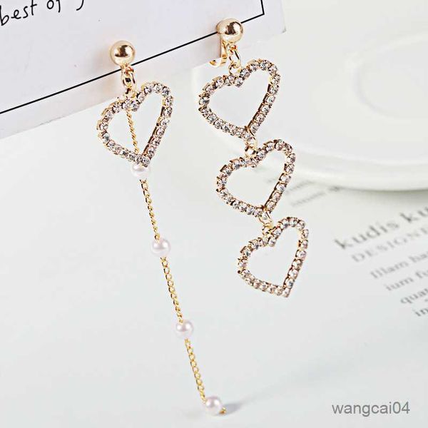 charm new korean charm pearl tassel crystal love heart clip earrings for women fashion asymmetric earring luxury jewelry r230719, Golden
charm new korean charm pearl tassel crystal love heart clip earrings for women fashion asymmetric earring luxury jewelry r230719, Golden