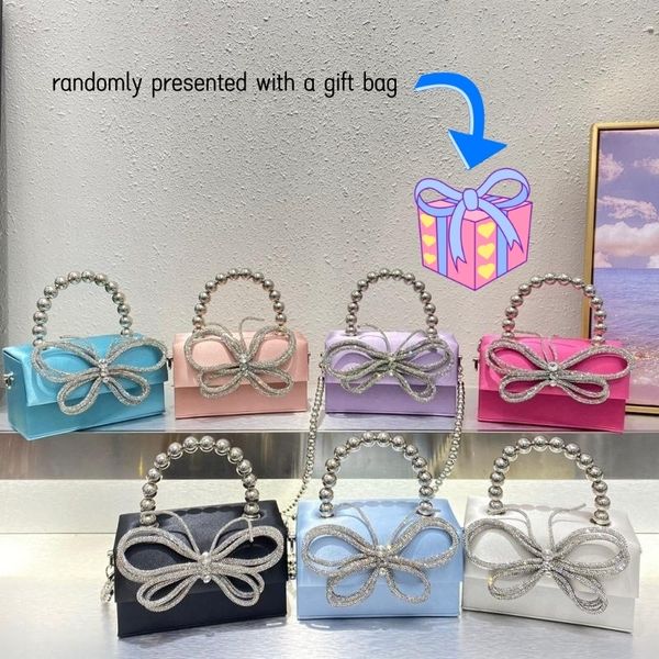 evening bags fashion high design bow knot pearl handheld women's prom evening bag wedding party catwalk one shoulder clutch wallet 2307
evening bags fashion high design bow knot pearl handheld women's prom evening bag wedding party catwalk one shoulder clutch wallet 2307