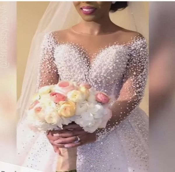 luxury arabic long sleeve wedding dress ball gowns sheer neck pearls beaded bridal dresses plus size chapel train zipper back woma9039391, White
luxury arabic long sleeve wedding dress ball gowns sheer neck pearls beaded bridal dresses plus size chapel train zipper back woma9039391, White