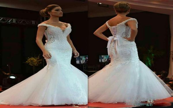 2019 elegant beaded pearls mermaid wedding dresses with offshoulder lace up back sheath wedding bridal gowns for bride vestidos1620429, White
2019 elegant beaded pearls mermaid wedding dresses with offshoulder lace up back sheath wedding bridal gowns for bride vestidos1620429, White