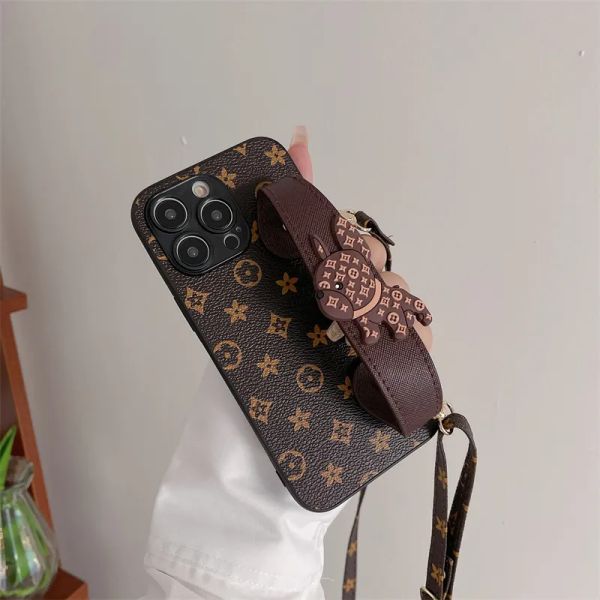 lanyard wrist strap luxurys designer phone case for iphone 14 pro max 13 12 11 classic letter fashion brand shockproof phones cases high qua
lanyard wrist strap luxurys designer phone case for iphone 14 pro max 13 12 11 classic letter fashion brand shockproof phones cases high qua