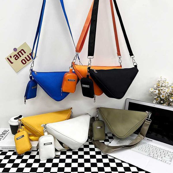 2023 solid color triangle nylon shoulder bag for women adjustable shoulder straps female crossbody bag designer luxury bag
2023 solid color triangle nylon shoulder bag for women adjustable shoulder straps female crossbody bag designer luxury bag