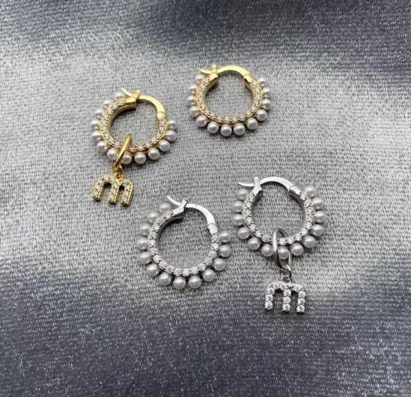 designer miao039s woman rings pearl inlaid classic letter earrings light fairy9984305, Golden;silver
designer miao039s woman rings pearl inlaid classic letter earrings light fairy9984305, Golden;silver