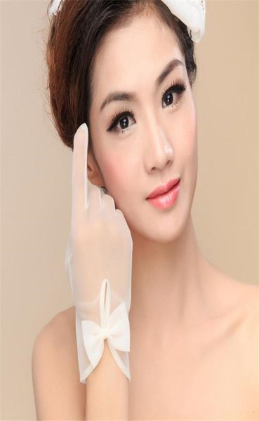 2020 short simple wedding bridal gloves with bow whiteivory tulle sheer wrist length full finger wedding party glove5737484, White
2020 short simple wedding bridal gloves with bow whiteivory tulle sheer wrist length full finger wedding party glove5737484, White