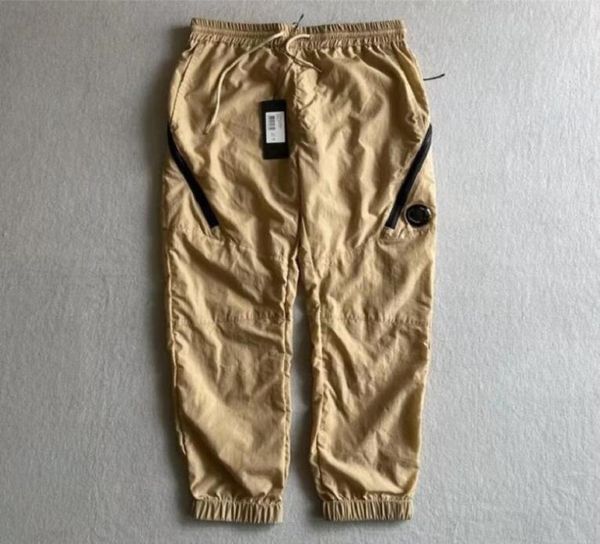 2022 ss metal nylon men pants one lens logo zipper pocket male pant outdoor tracksuit casual jogging trousers6042544, Black;green
2022 ss metal nylon men pants one lens logo zipper pocket male pant outdoor tracksuit casual jogging trousers6042544, Black;green