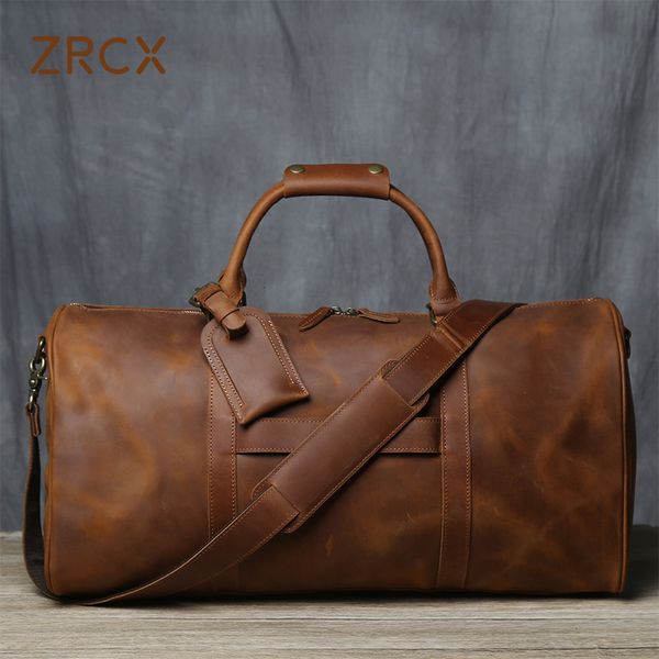 duffel bags zrcx retro men's hand luggage bag travel bag geunine leather large capacity single shoulder messenger for 15 inch lap230719
duffel bags zrcx retro men's hand luggage bag travel bag geunine leather large capacity single shoulder messenger for 15 inch lap230719