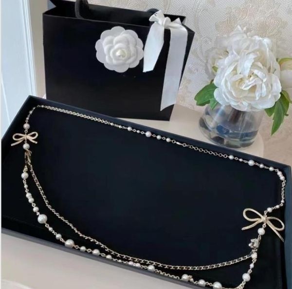 new belt fashion design ladies luxury style bow pearl chain style with box, Black;brown
new belt fashion design ladies luxury style bow pearl chain style with box, Black;brown