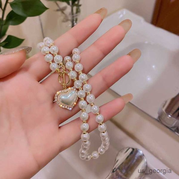 pendant necklaces elegant big white pearl bead necklace for women crystal heart shell pendant sweet wedding party jewelry femme r230829, Silver
pendant necklaces elegant big white pearl bead necklace for women crystal heart shell pendant sweet wedding party jewelry femme r230829, Silver